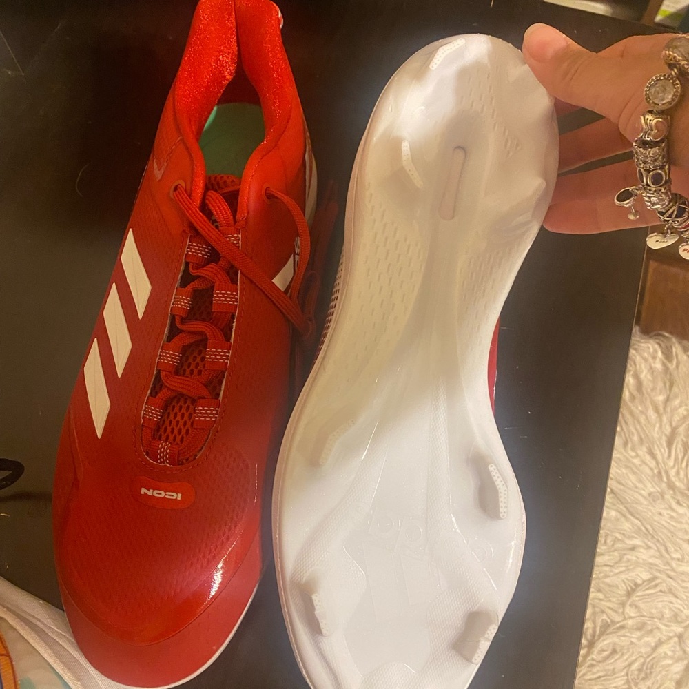 Baseball sneakers.  Size mens 12.   Brand new adidas.  Never work